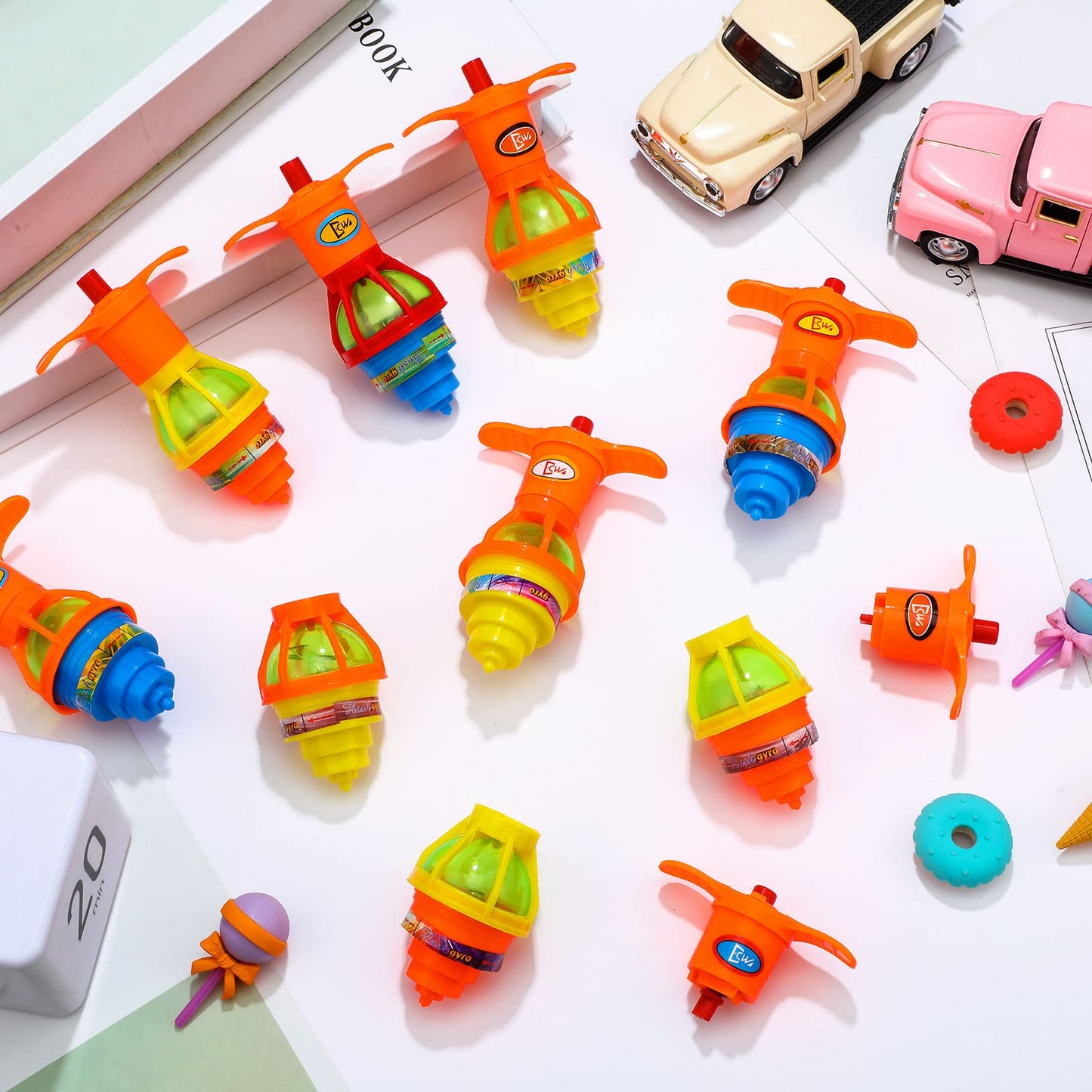 Chivao 50 Pcs Bulk LED Light up Spinner Tops Launcher with Gyroscope Motion Colorful Flashing Spinner Toys Novelty Party Favors for Birthday Events Goodie Bag Fillers Stuffers